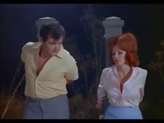 Orgía de la muerto 1965 zombi desvistiéndose diablo joven dama cráneo.